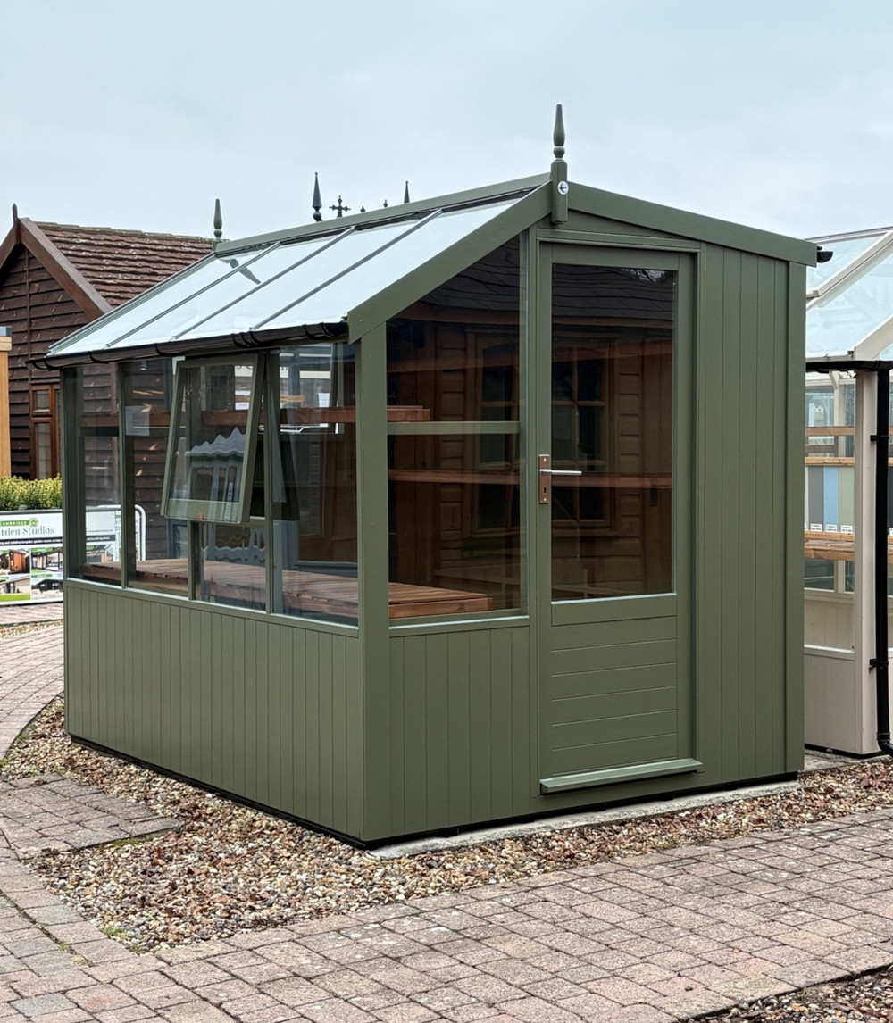 Jay 6ft 8in x 8ft 4in (2.03m x 2.55m) in optional painted finish, with guttering